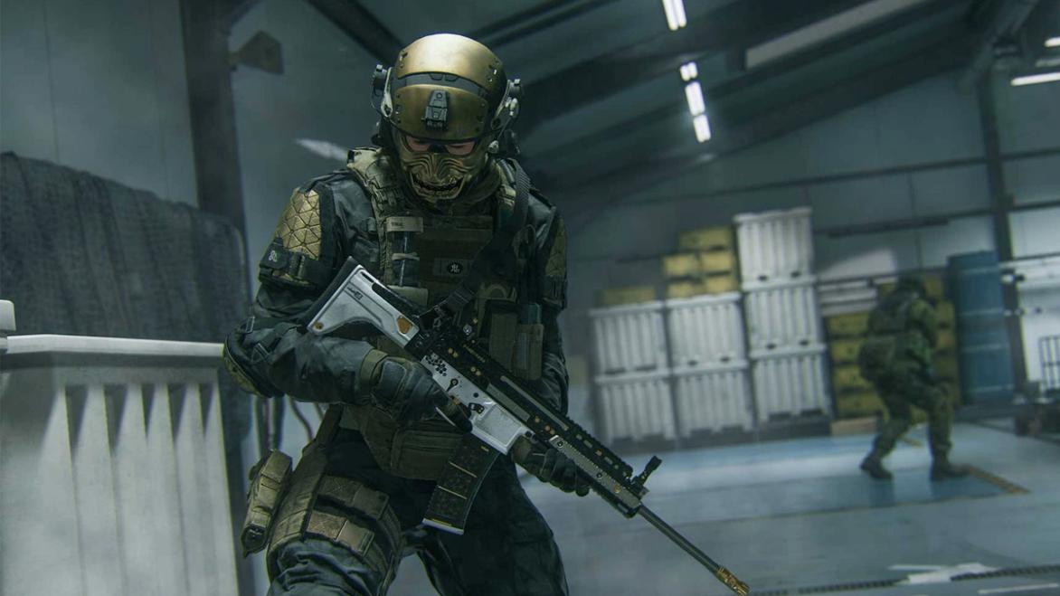 Screenshot of Modern Warfare 3 player holding assault rifle while looking down